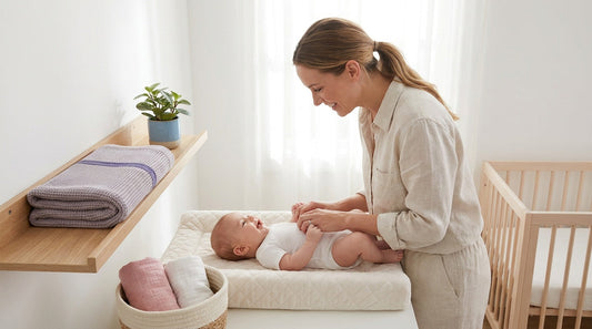 how to keep a baby still while changing diaper?